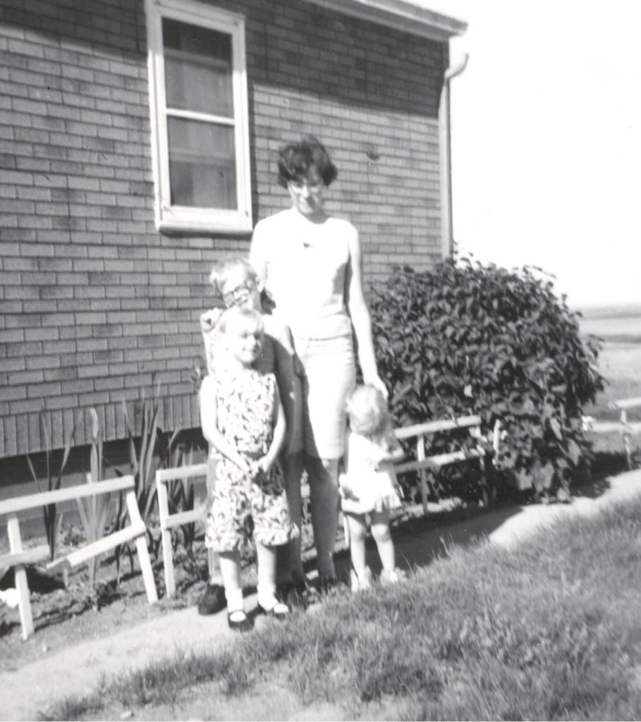 Rusty's mom, Rusty, Robbi and Renee in 1968. Northeastern Montana. Outside their tiny house on the plains